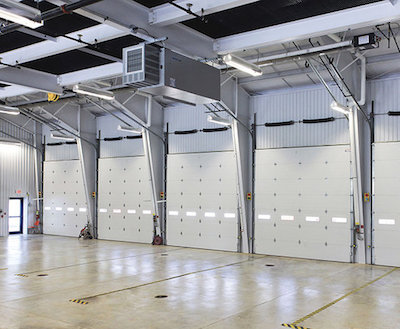 sectional doors door overhead industrial operated motor vision